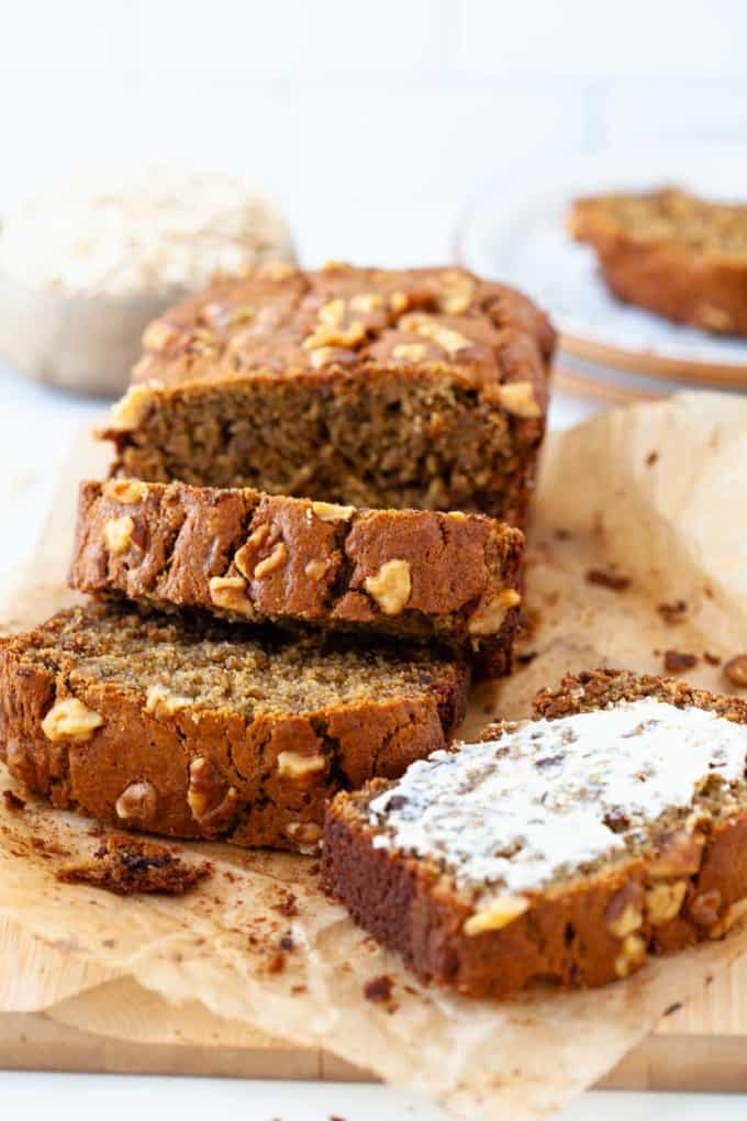 four slices of oat flour banana bread on brown parchment paper