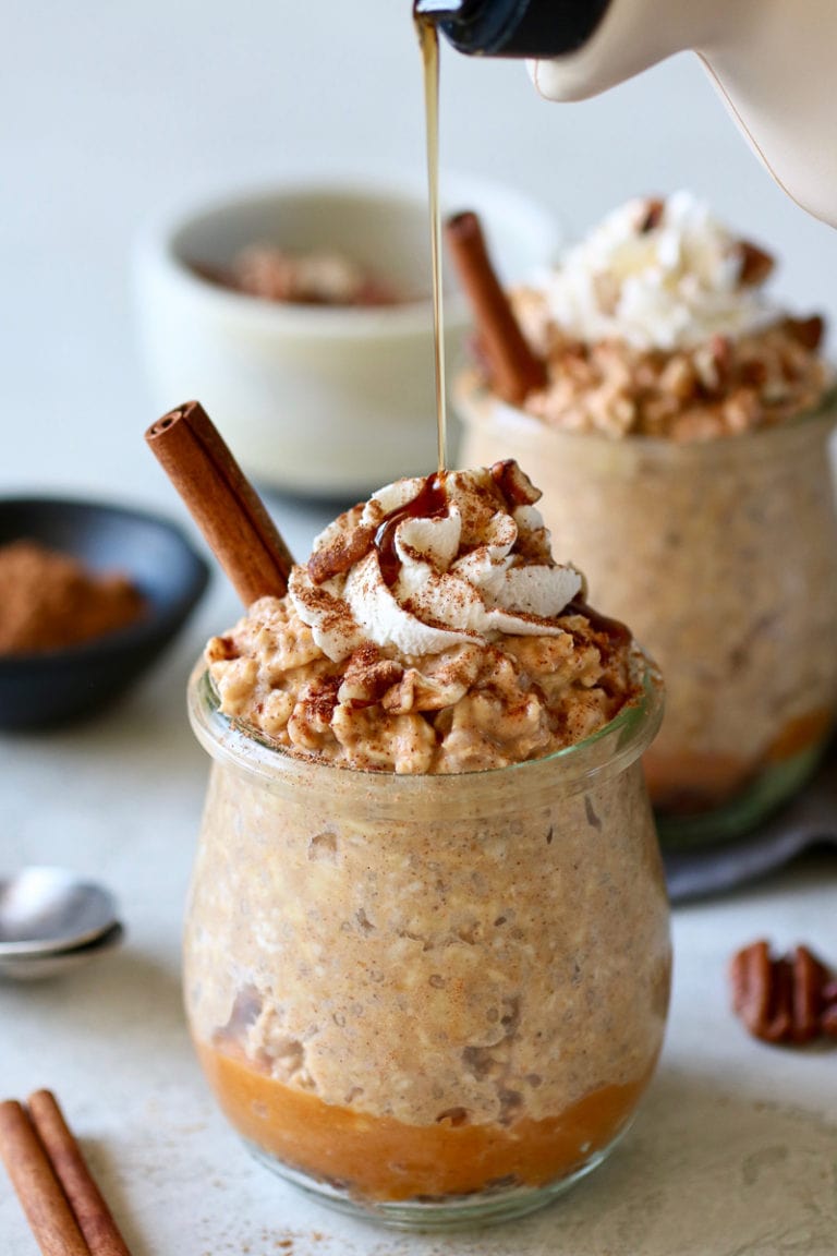 Pumpkin Pie Overnight Oats being drizzled with maple syrup. 